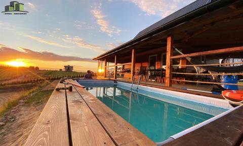 Dom z basenem na Mazurach...